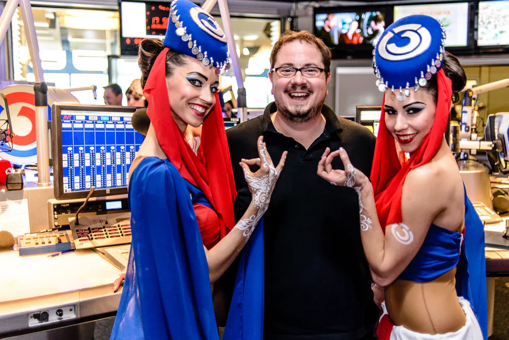 Armin Rogl at media training with performers in costume